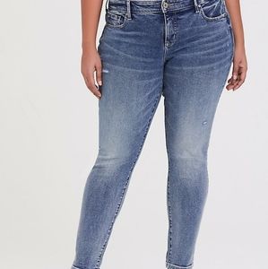 Torrid Denim mid-rise skinny jeans medium wash distressed cotton blend jeans